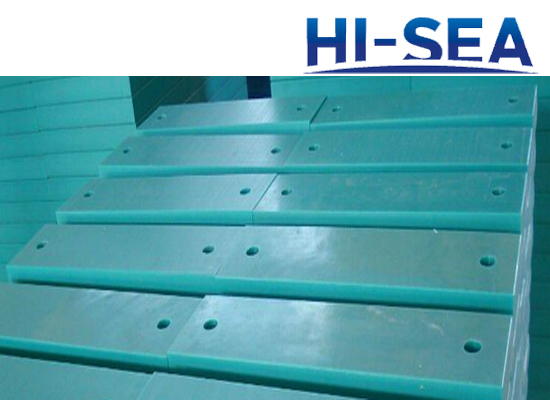 Rubber fender UHMW PE facial pad